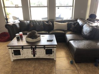 Leather couch plus ottoman down pillows included