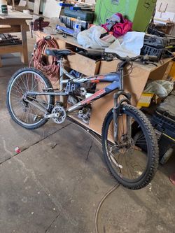 Mongoose XR250 26-inch full-suspension mountain bike.