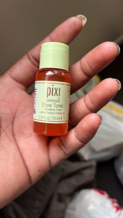 This is a 15ml (0.5 fl oz) travel-sized bottle of Pixi Skintreats Glow Tonic, an exfoliating toner.The formula contains 5% Glycolic Acid, ginseng, and