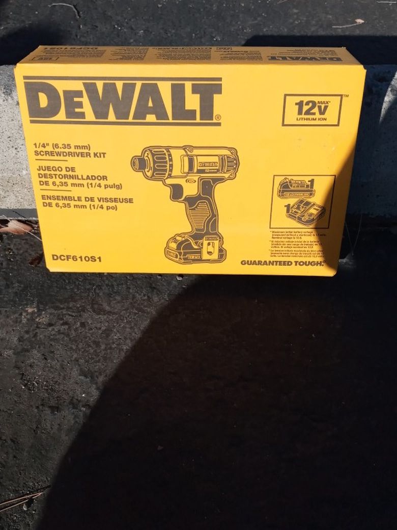 Brand New In The Box Dewalt 1/4 Inch Screwdriver Kit With Charger And Battery