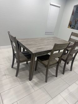 Dining table with 4 chairs & bench