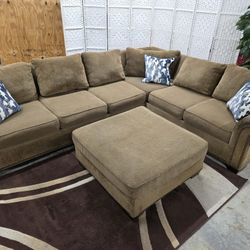 Ashley Furniture Sectional with Ottoman
Delivery Options Available!