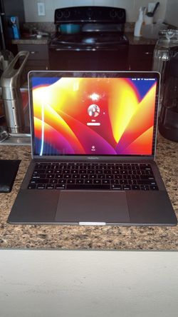 MacBook Pro 2017 with charger and usb adapter