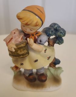 Vintage Wales Japan Girl with Rabbit in Basket Figurine.
Knick Knack.