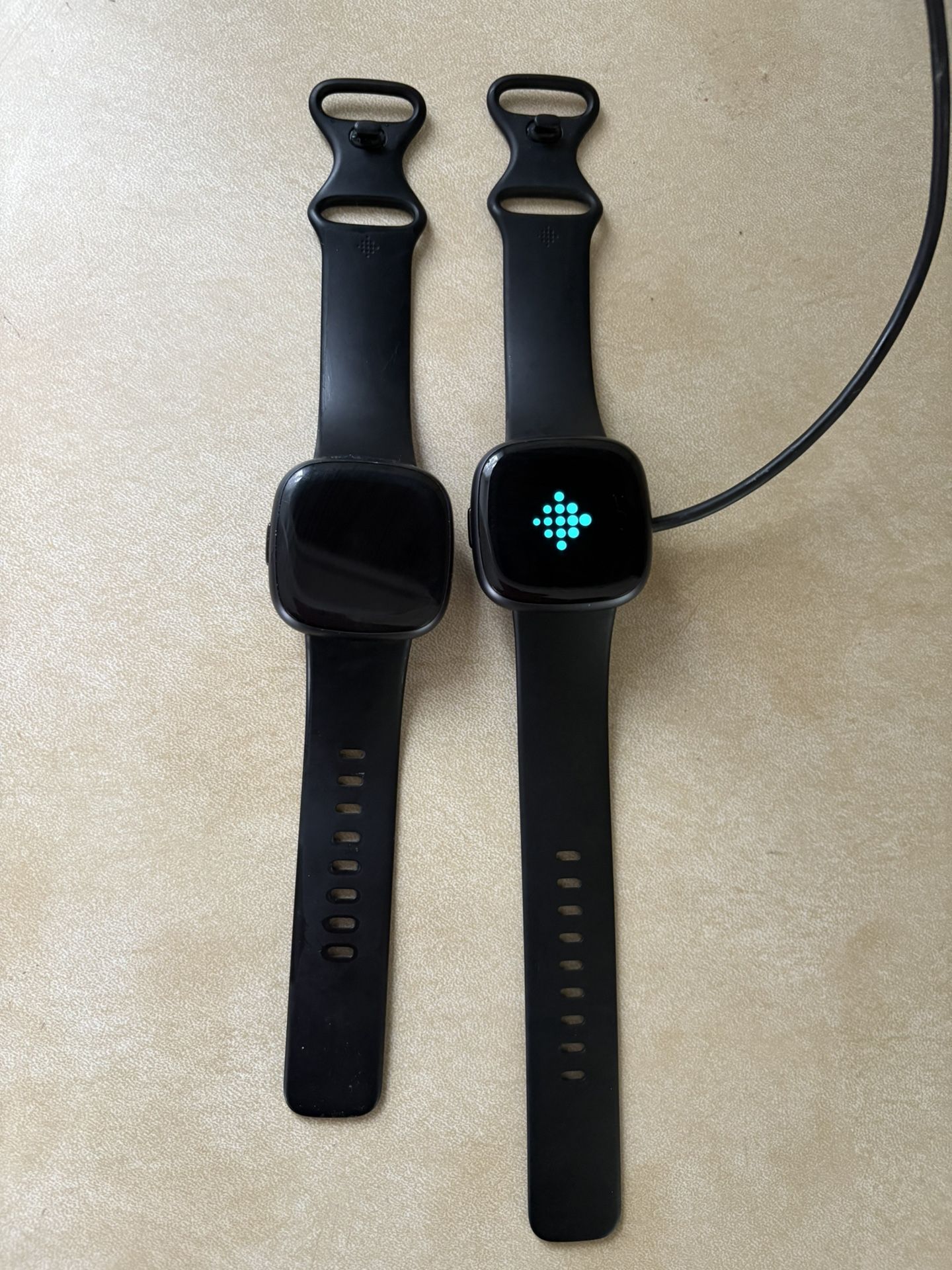 2 Fitbit-Versa 4’s