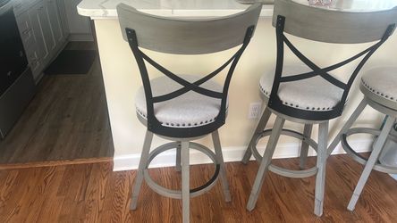 One Swivel Bar Stool