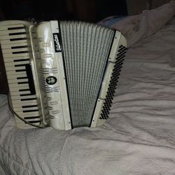 SILVER TONE ACCORDION