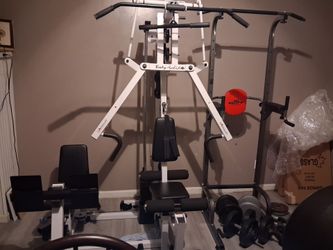 Weight machine with leg press and power tower pull up bar and hand Weights dumbells cash only