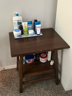 Dark brown wooden side table