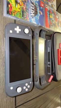 Nintendo Switch Lite W Games/Cases $$$
