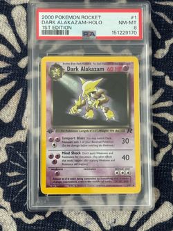 2000 Pokémon Team Rocket Dark Alakazam 1st Edition Holo #1/82 (PSA 8)