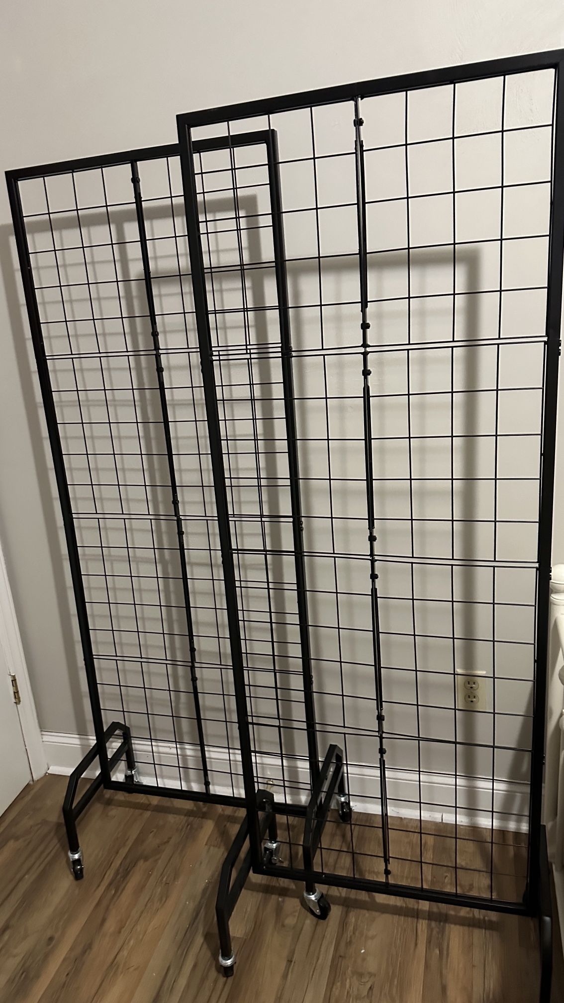 Two Metal Display Grid Wracks With Wheels