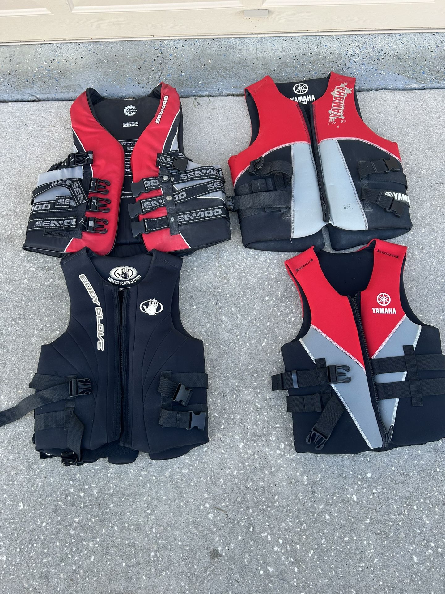 Life Jackets. Set If 4 Yamaha Sea Doo Body Glove