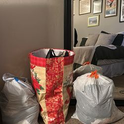 3 bags of women’s clothes size S /M , purses, shoes size 8, and accessories