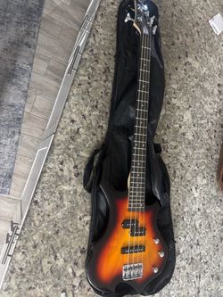 4-String Electric Bass Guitar with amp