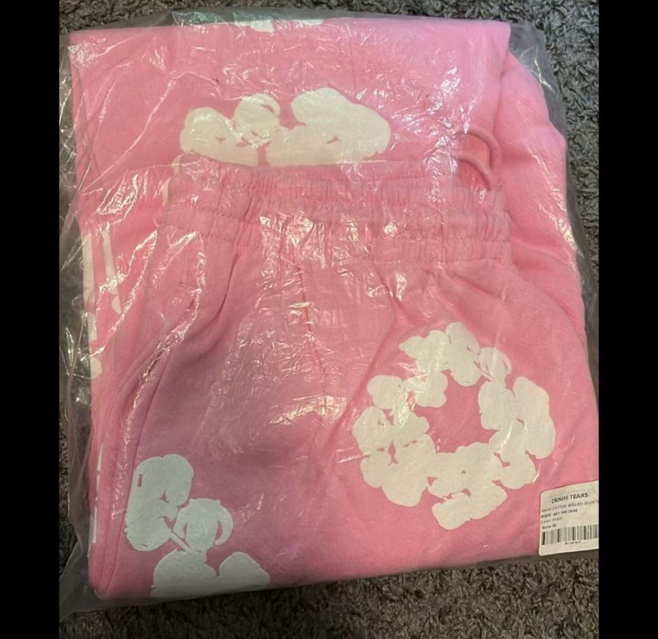 Pink Denim tear size medium