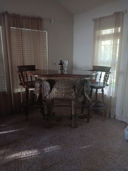 Elephant Bar Table 2 Swivel Bar Chairs