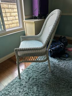 Wicker chair with cushion