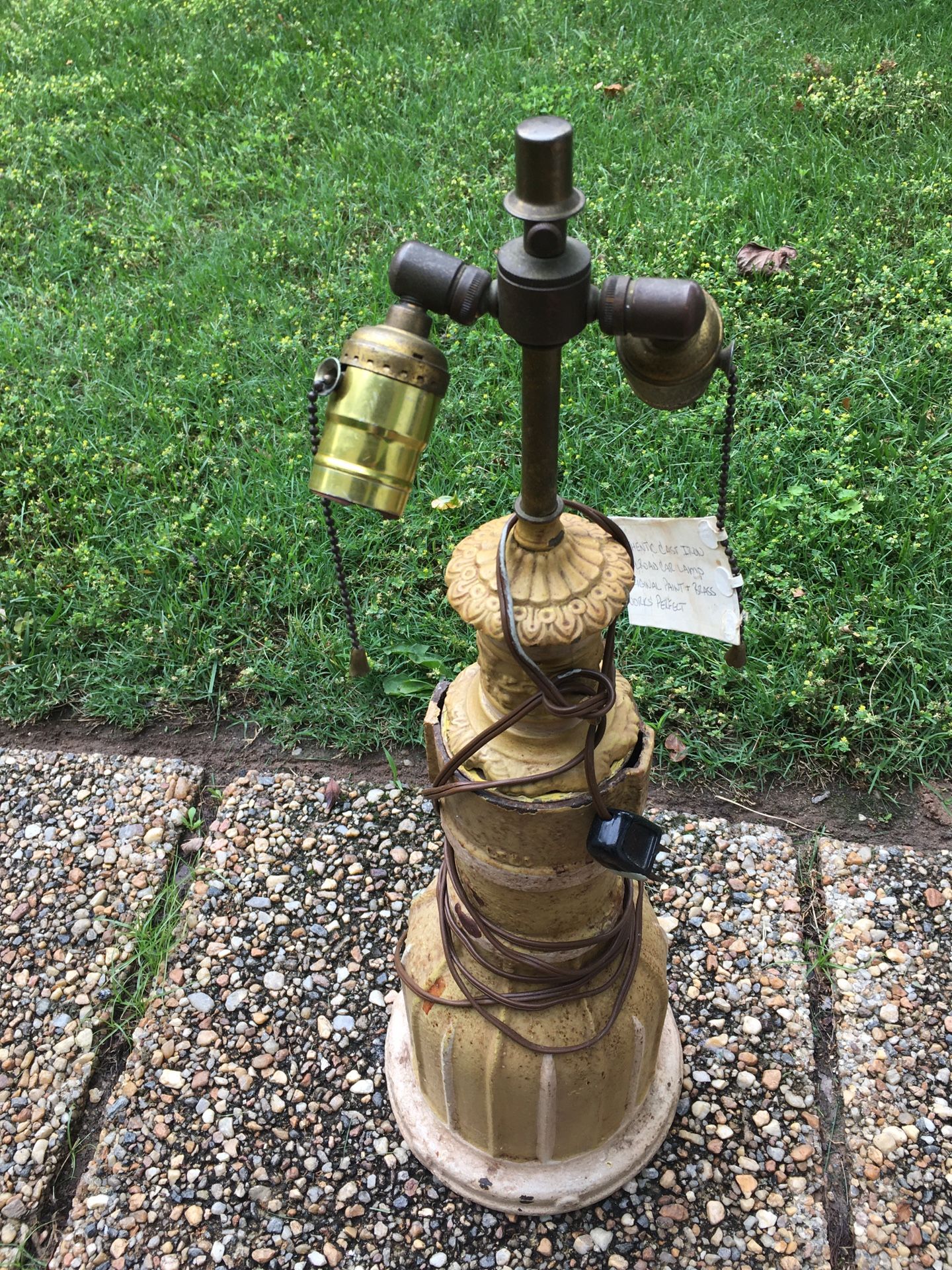 Authentic Cast iron railroad car lamp original paint and brass works perfect Heavy cast iron 2’T Base 7 1/2 round Will not reply to scammers Pick