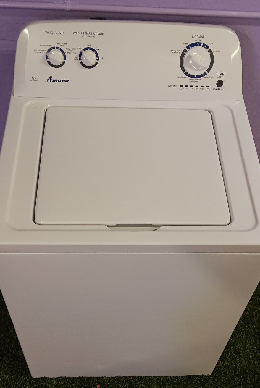 Amana washing machine by Whirlpool in perfect condition, large tub.