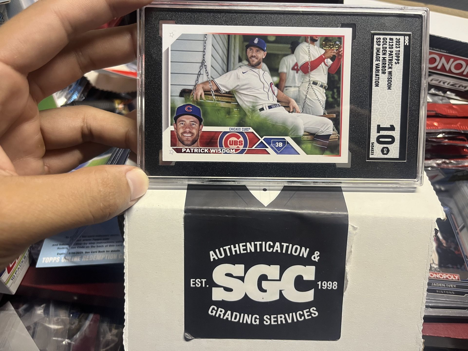 2023 Topps Series 1 Patrick Wisdom Golden Mirror Image Variation SSP SGC Gem MT 10