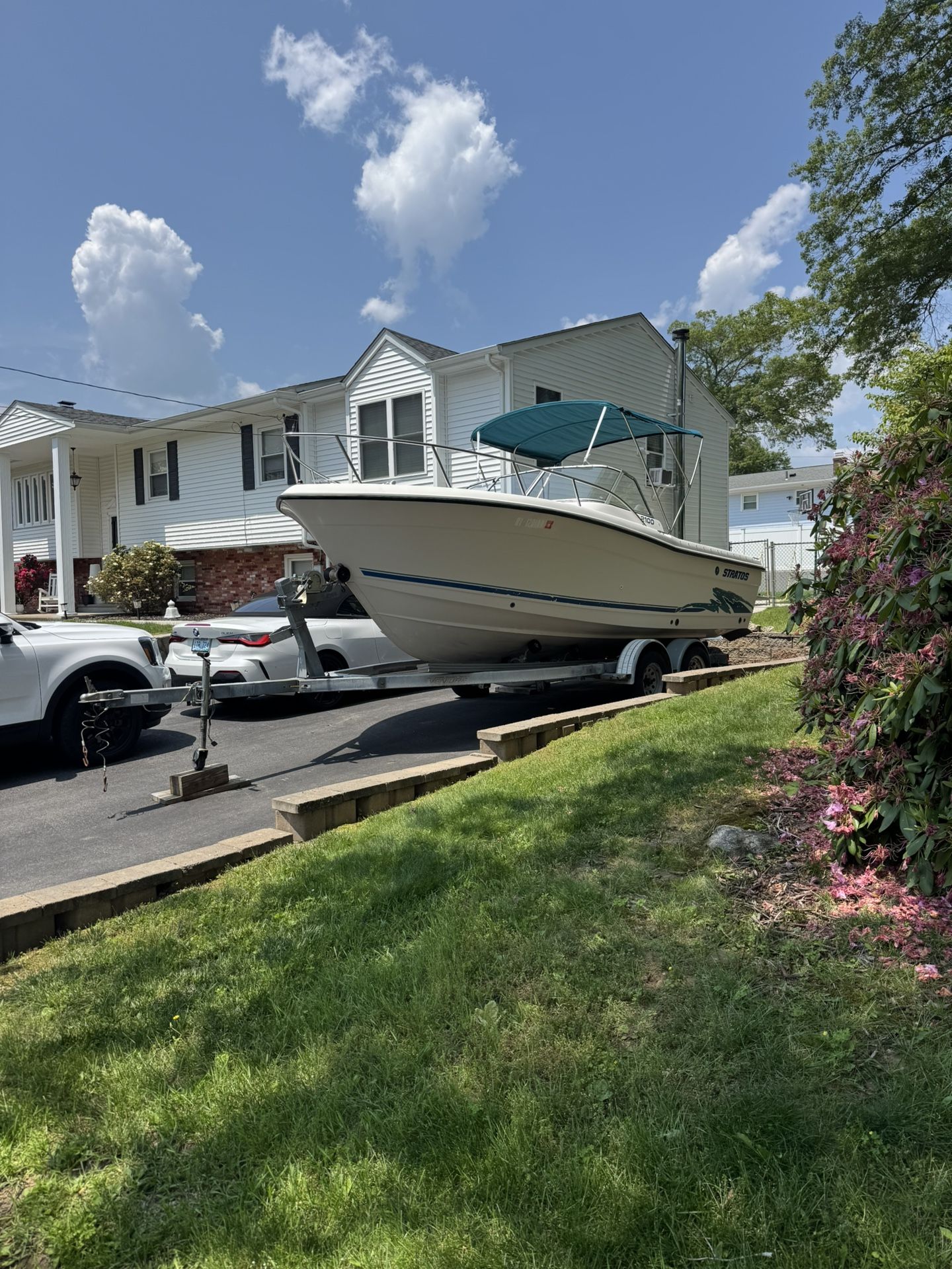21’ Stratos Dual Console Boat with 200HP Johnson Motor and Trailer