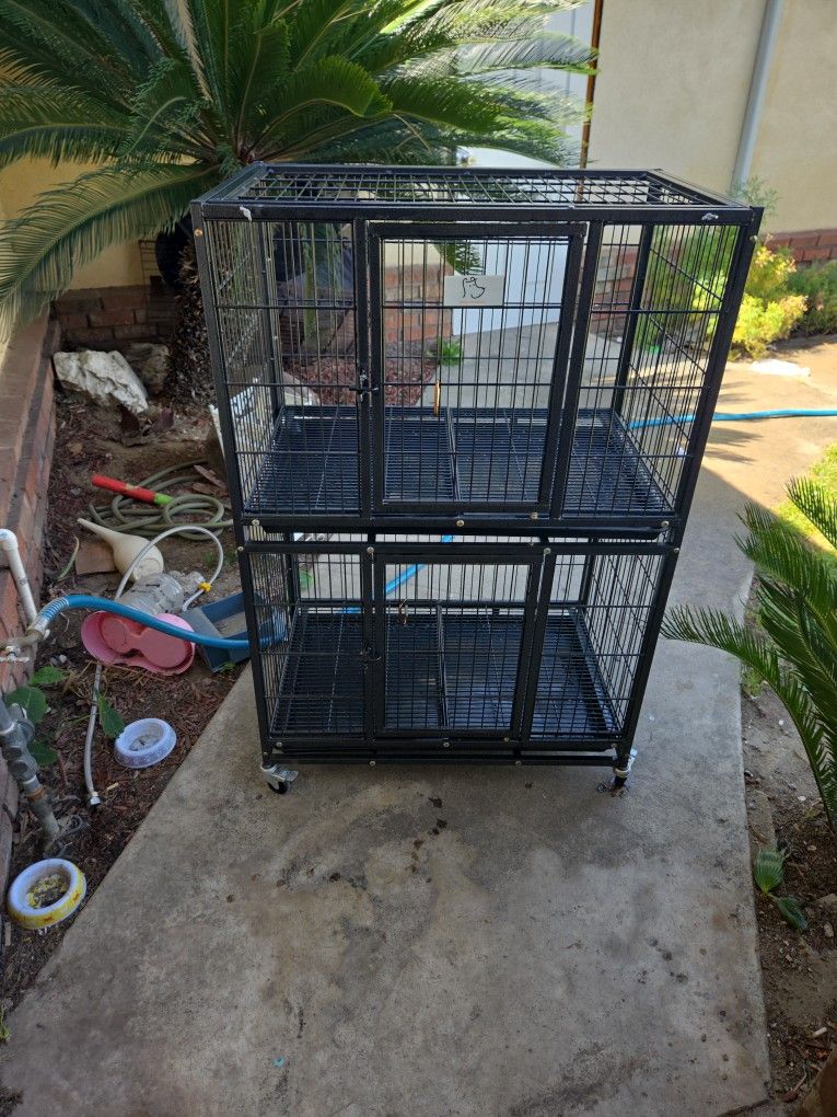 $75 2 Tier Dog Crate On Casters