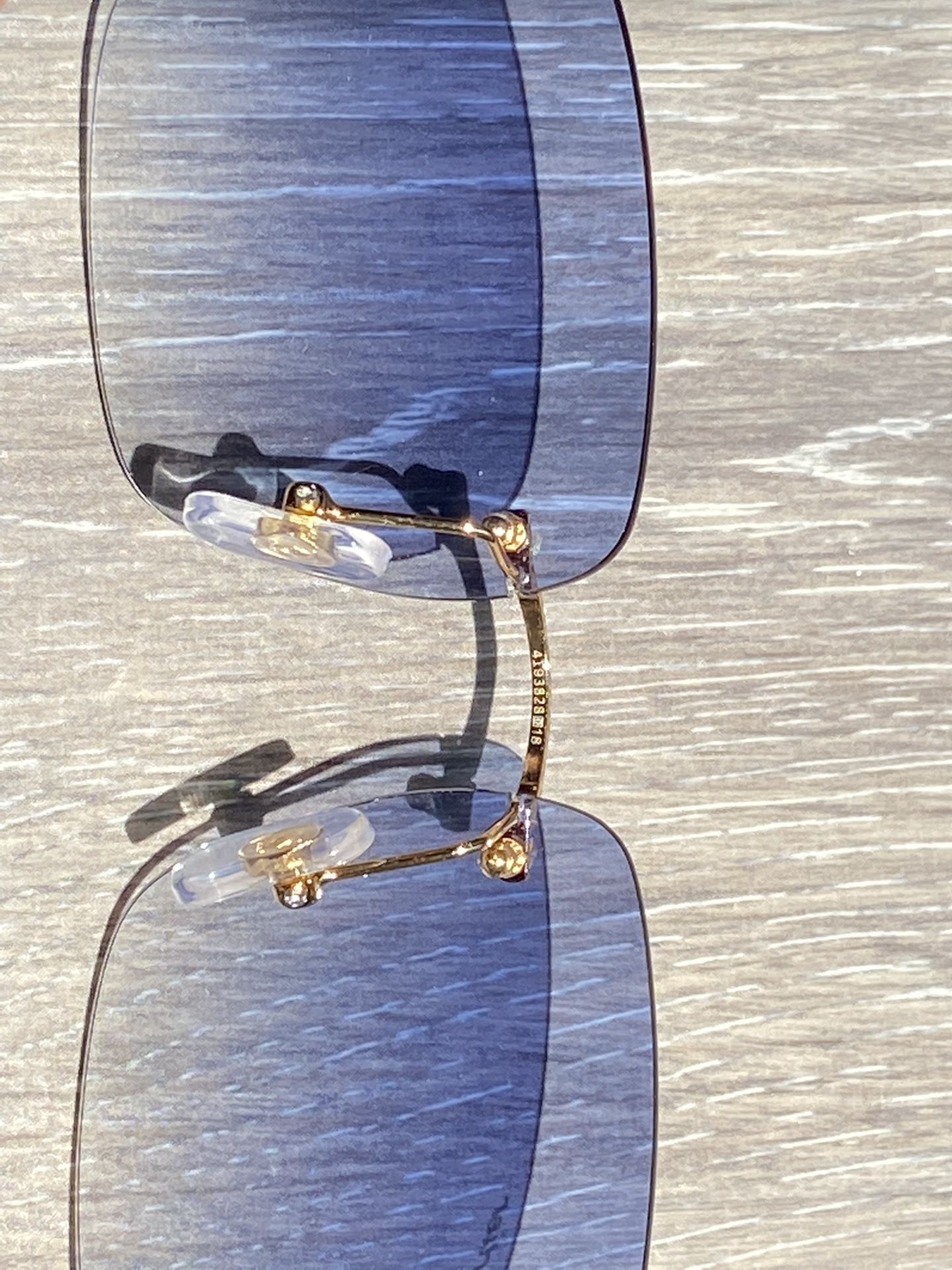 blue cartier glasses