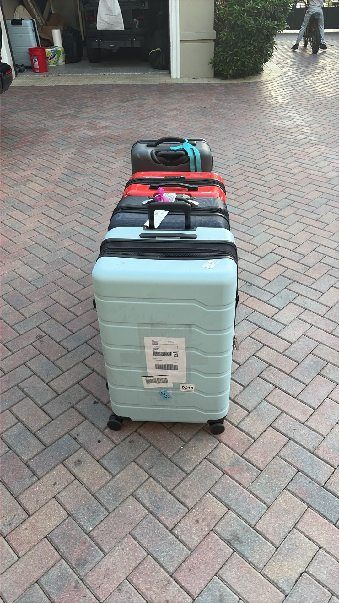 Four Suitcases With Locks And Fit A Lot Of Clothes