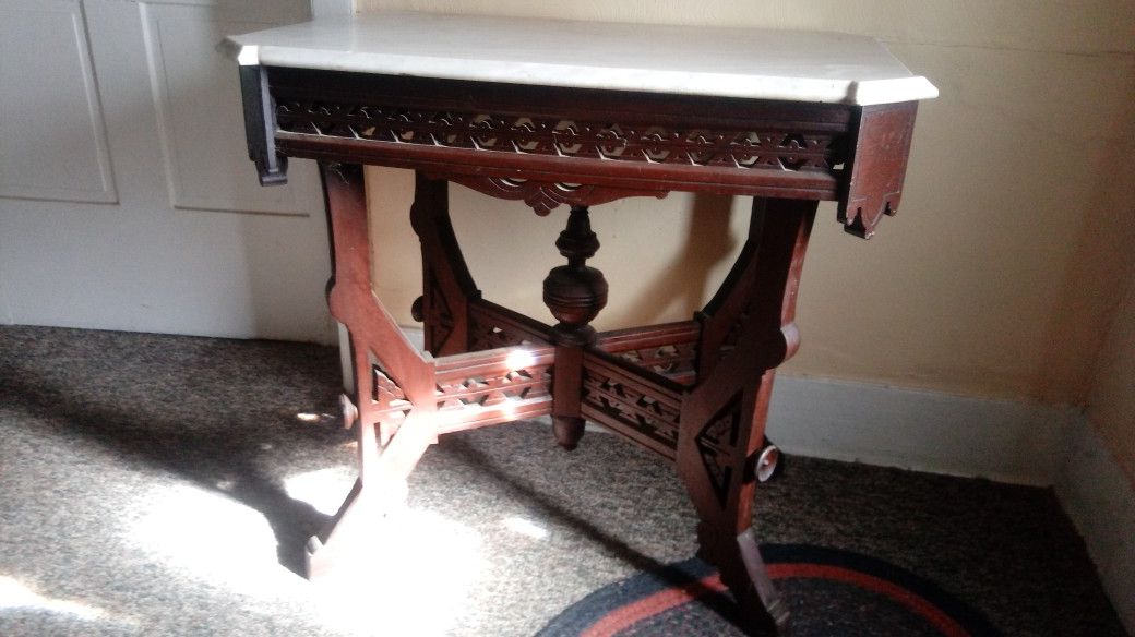 Antique occaissional table ,westlake and marble top. Great detail and craftsmanship