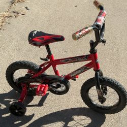 12in Huffy Rock It. With Training Wheels.