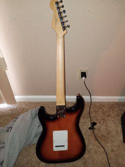Squier fender guitar and fender amp