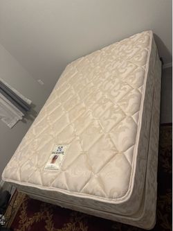 Full sized mattress, box spring, and metal frame