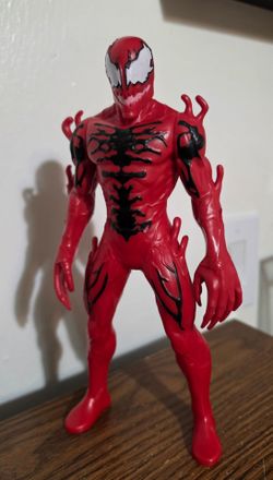 Hasbro Marvel Carnage Action Figure, part of the 9.5-inch/Titan Hero-style line based on the Spider-Man and Venom universe.