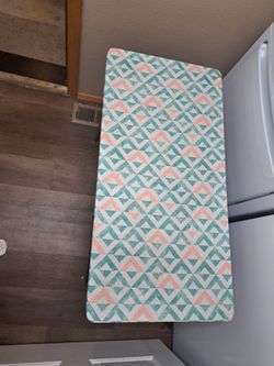 Old school desk with decorated waterproof top