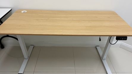 Electric Standing Desk – Like New – $90 Like-new electric height adjustable desk in excellent condition. No defects and works perfectly. 	•	Electric h