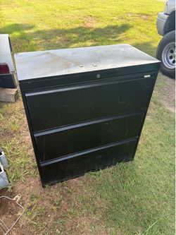 Black storage cabinet with keys