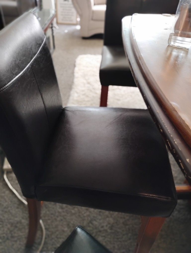 Table And Leather Chairs
