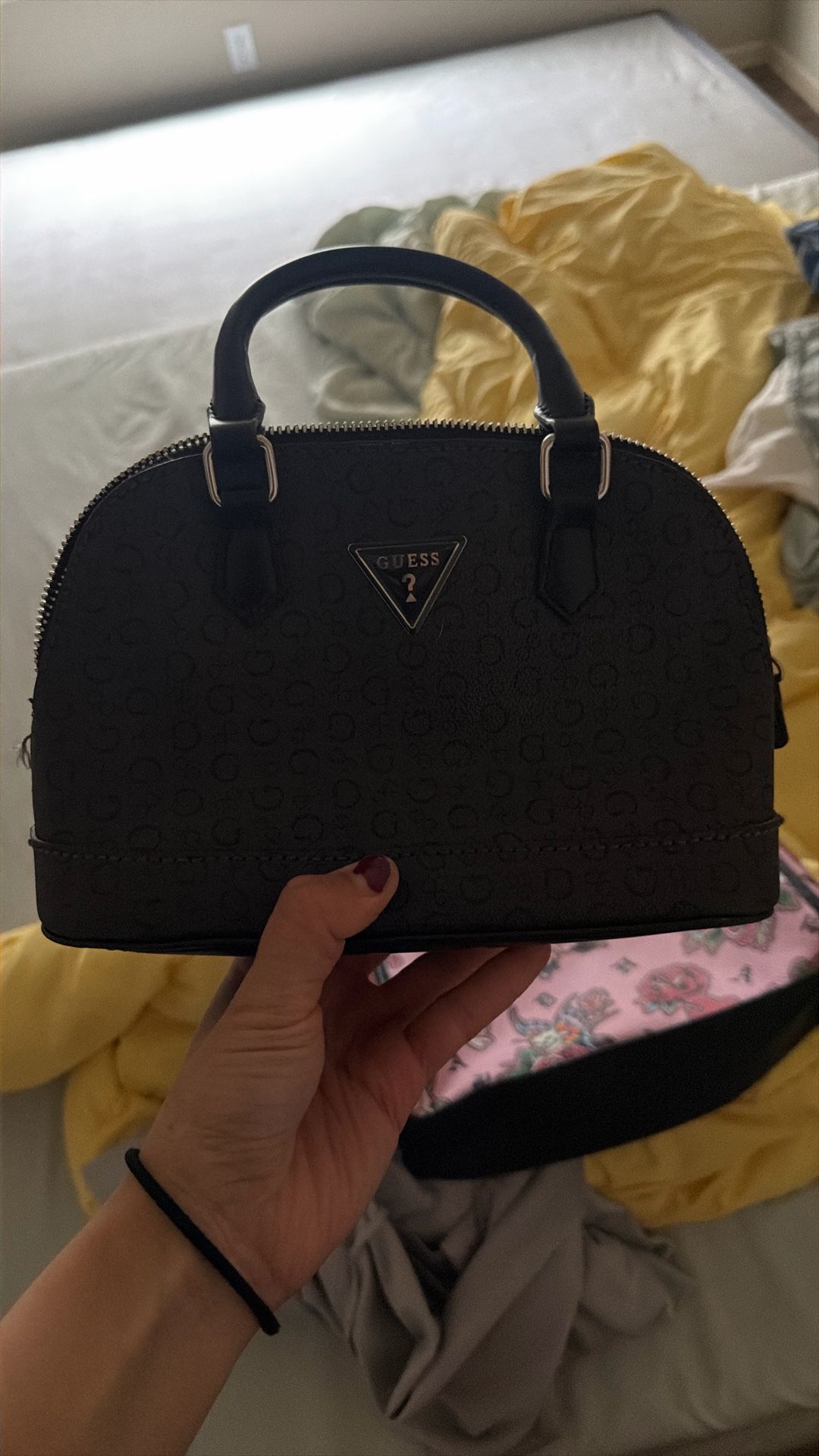GUESS Women's Jenai Dome Satchel in black with a logo embossed pattern