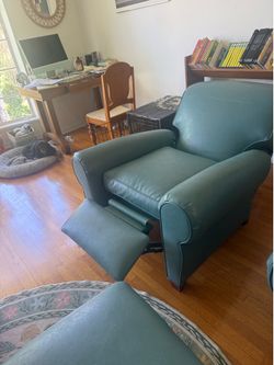 Comfy vintage recliners and matching footstool.