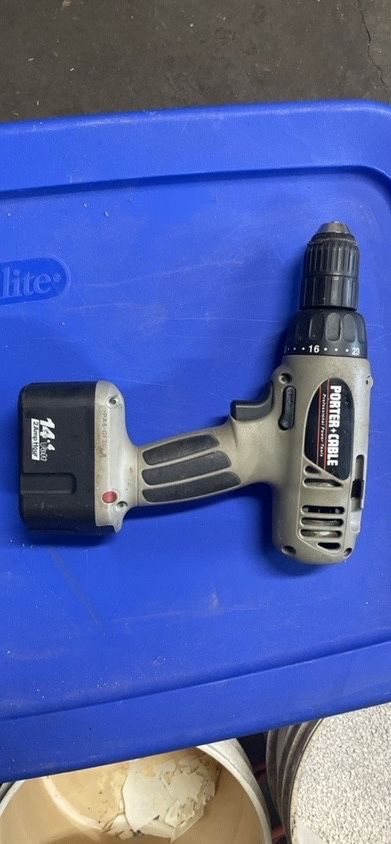 Porter Cable Model 878 1/2” Cordless Drill/Driver 14.4V w/ case, extra battery, charging base, and bits