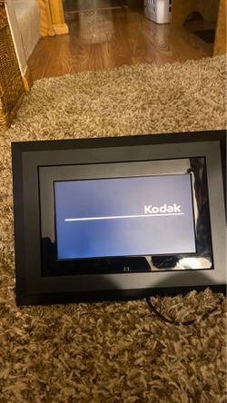 Kodak digital picture frame. Capable of playing music to slide show and videos.