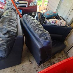 Free Blue Reclining Couch And Matching Loveseat.