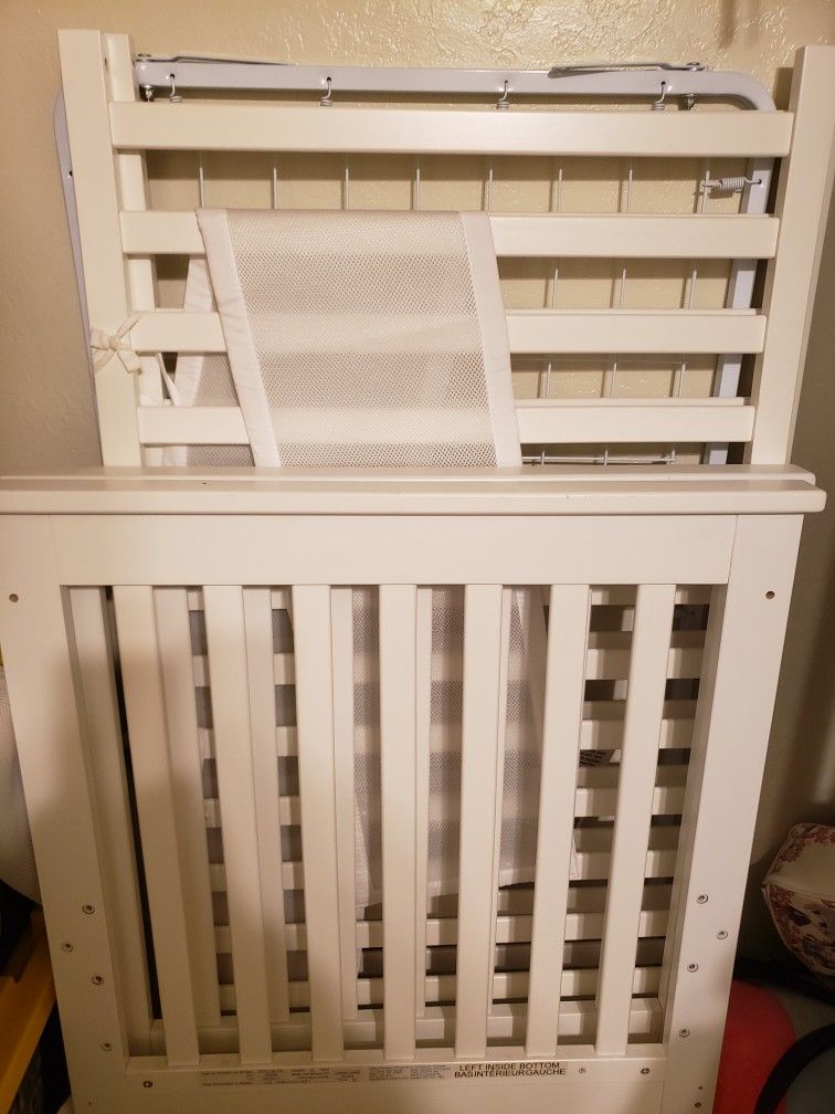 new crib slightly used changing table