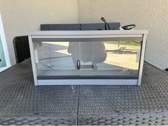 24” reptile enclosure w/ heating mat.
