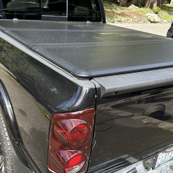 Hard trifold tonneau 2002 up 6’4” bed