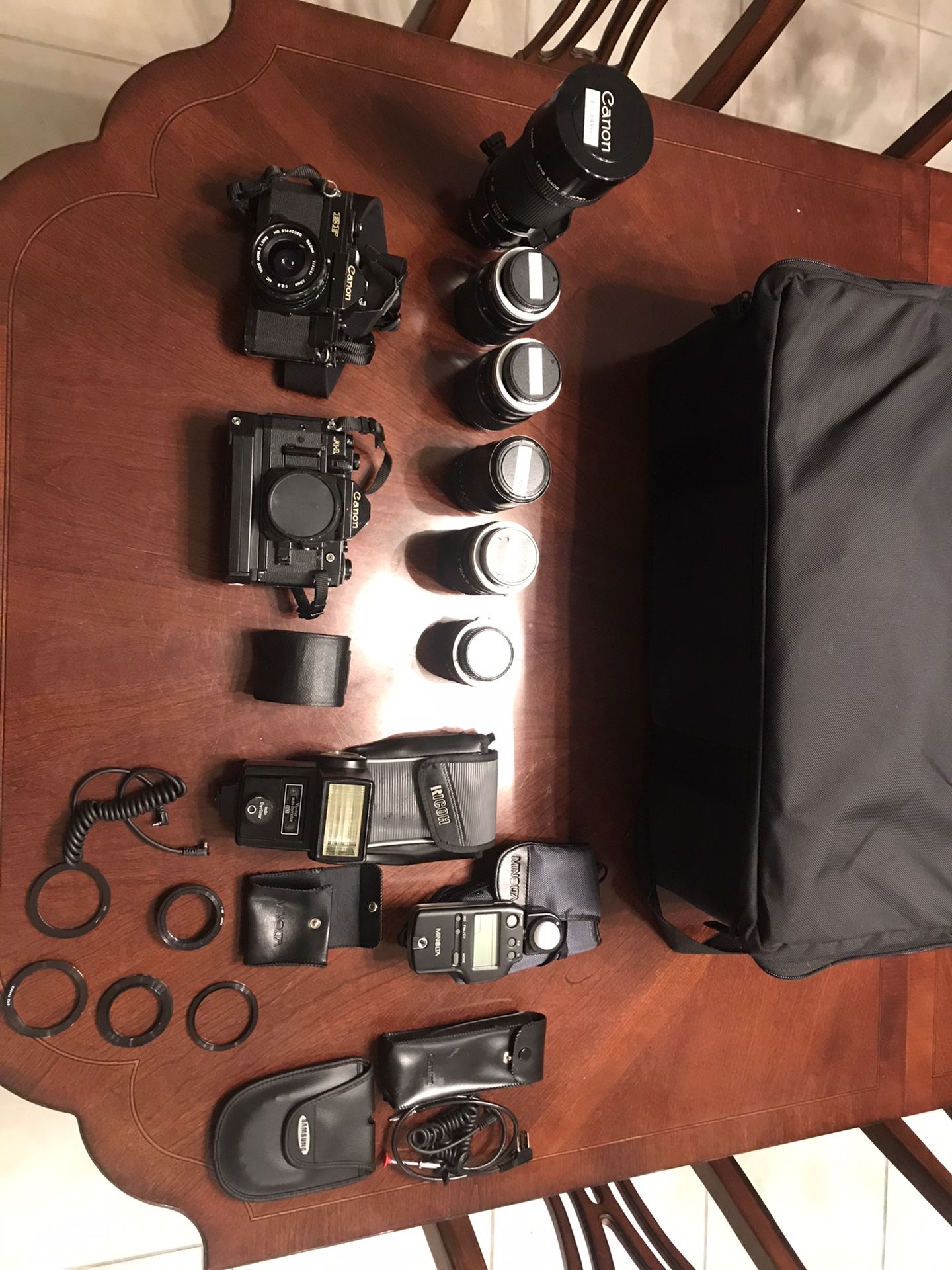 Canon cameras with asst of lenses $250