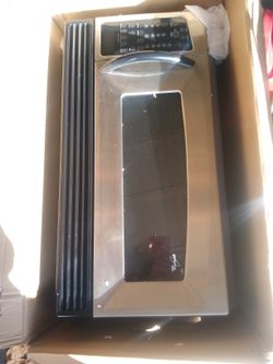 Microwave Hangs Over Stove 