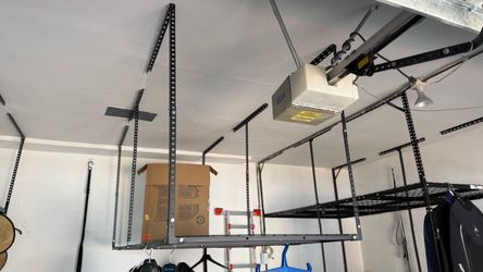 Adjustable metal ceiling frame for storage