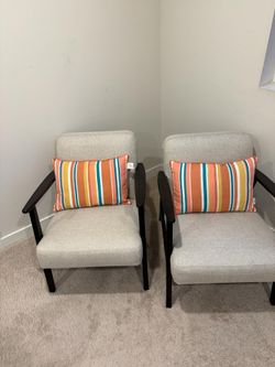 2 Corner chairs with pillows